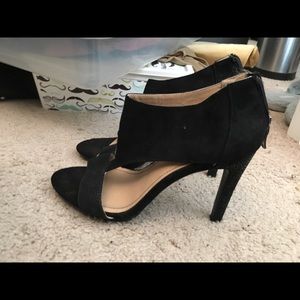 Black suede pumps